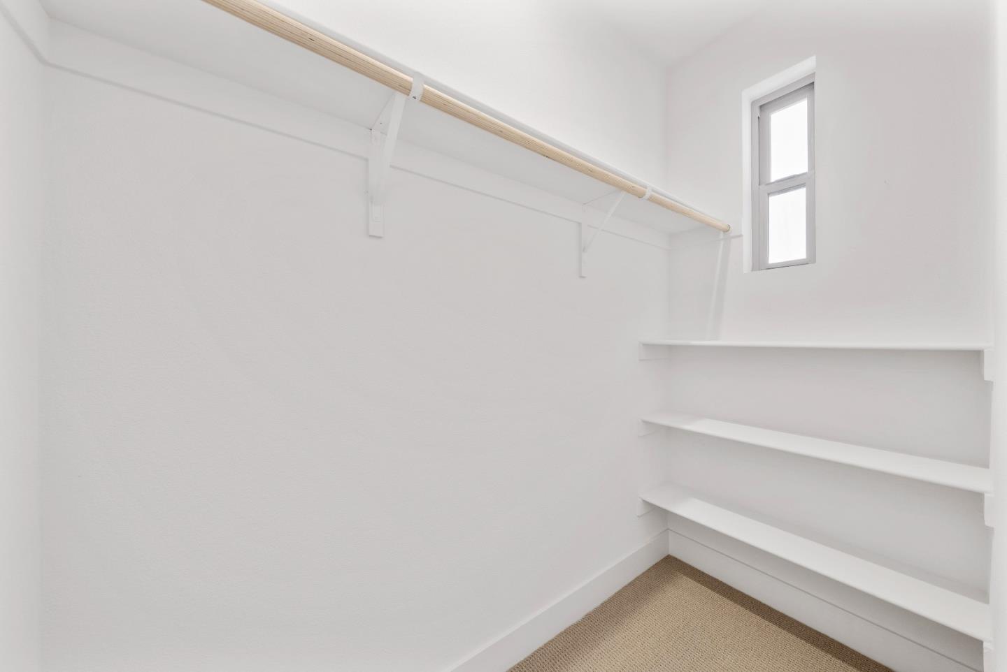 307 Marquetta Circle Mountain View, CA 94043 - Photo 20 of 38 a view of small space with racks on the wall