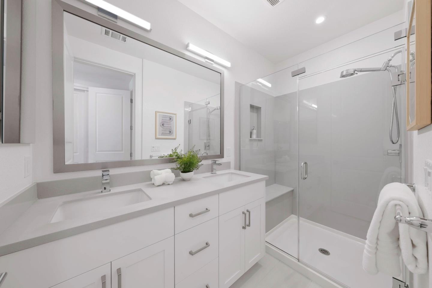 307 Marquetta Circle Mountain View, CA 94043 - Photo 22 of 38 a bathroom with a shower sink and mirror