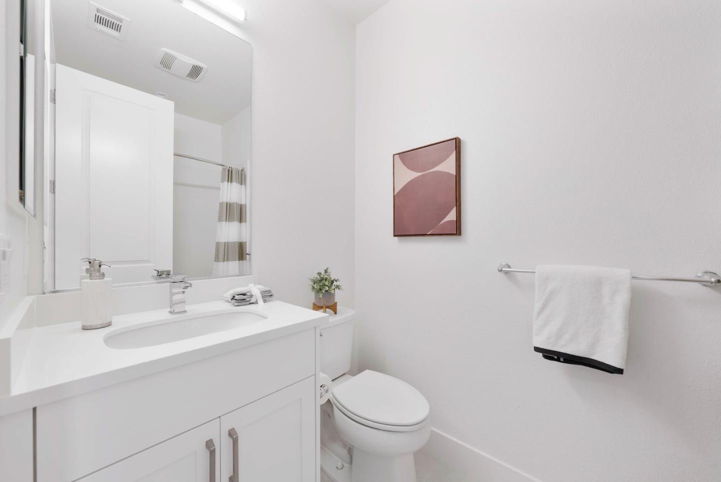 307 Marquetta Circle Mountain View, CA 94043 - Photo 27 of 38 a bathroom with a toilet sink and mirror