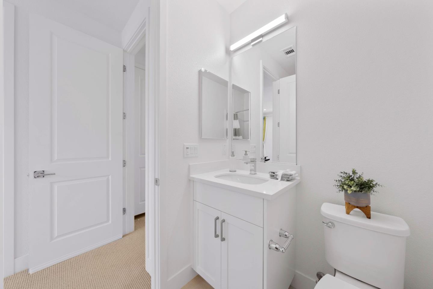 307 Marquetta Circle Mountain View, CA 94043 - Photo 28 of 38 a bathroom with a sink a toilet and a mirror