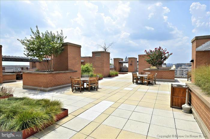 616 E Street Northwest, Unit 1014 Washington, DC 20004 - Photo 11 of 12 a view of a terrace with chairs
