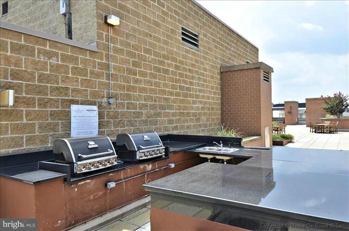 616 E Street Northwest, Unit 1014 Washington, DC 20004 - Photo 10 of 12 a view of a outdoor space with sitting area