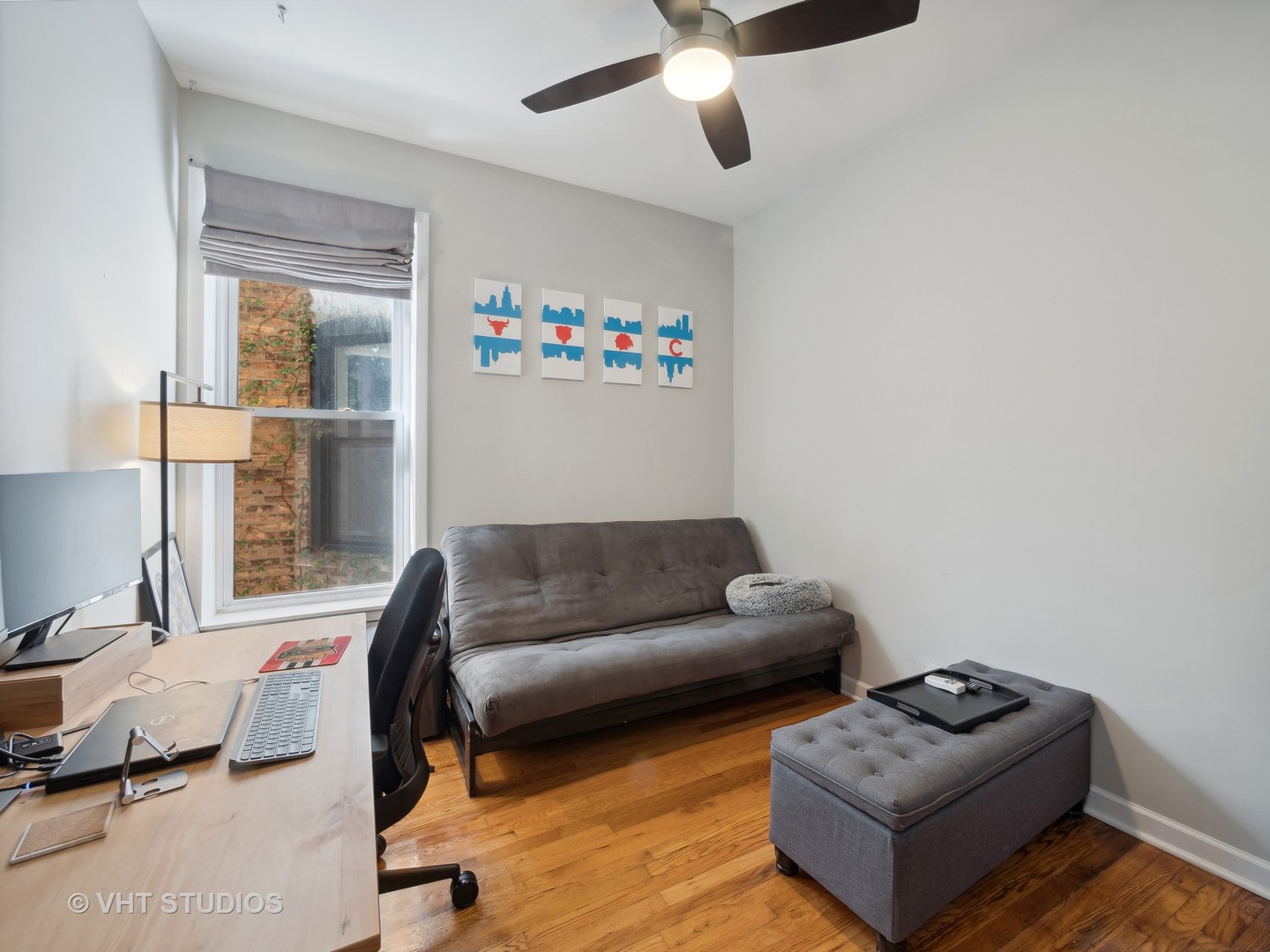 1023 West Dakin Street, Unit 2W Chicago, IL 60613 - Photo 6 of 10 a living room with furniture and a window