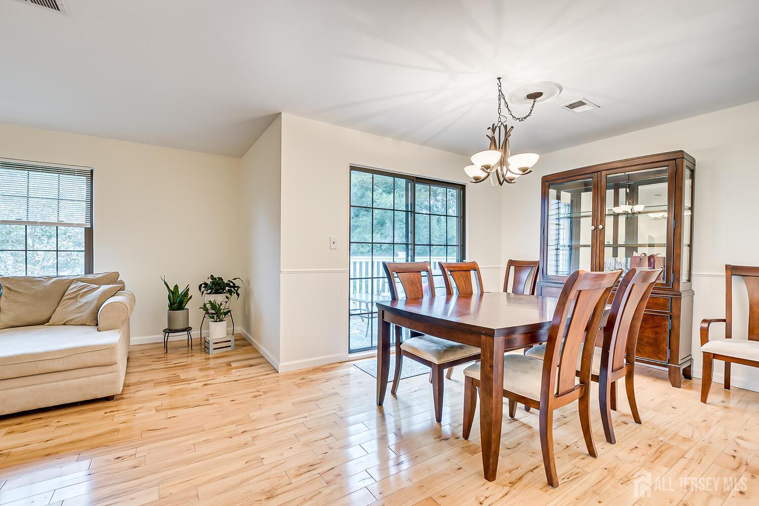 30-5 Prospect Street, Unit 2 Metuchen, NJ 08840 - Photo 6 of 23 a view of a dining room with furniture window and wooden floor