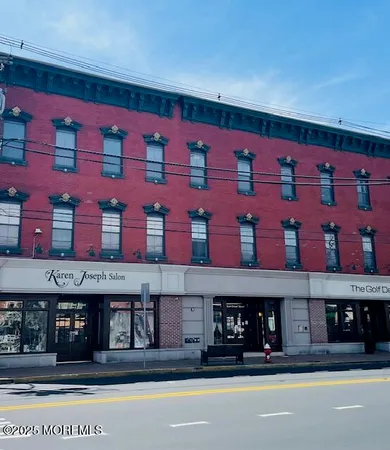 a front view of multi story residential apartment building