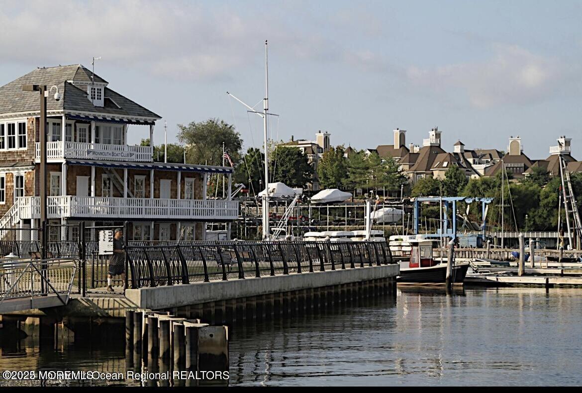 8 East Front Street, Unit 204 Red Bank, NJ 07701 - Photo 12 of 13 a view of a lake with a house