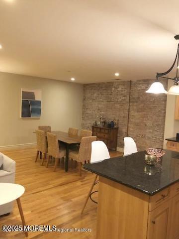 8 East Front Street, Unit 204 Red Bank, NJ 07701 - Photo 5 of 13 a view of a dining room with furniture