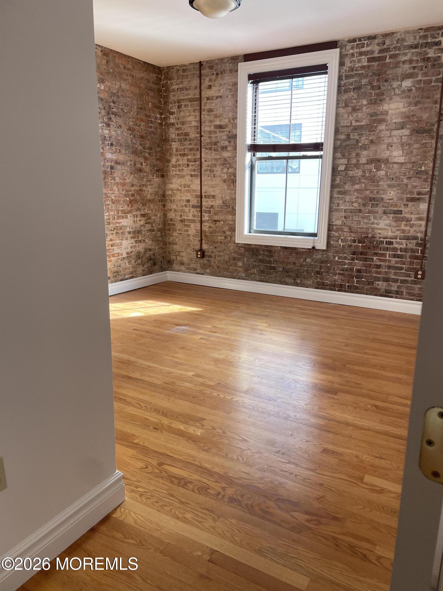 8 East Front Street, Unit 204 Red Bank, NJ 07701 - Photo 5 of 15 a view of a room with window