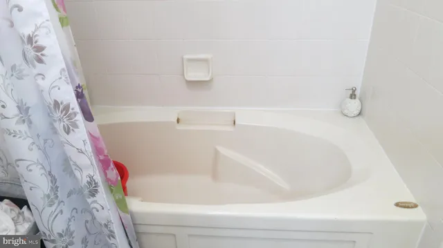 a bathroom with a bathtub