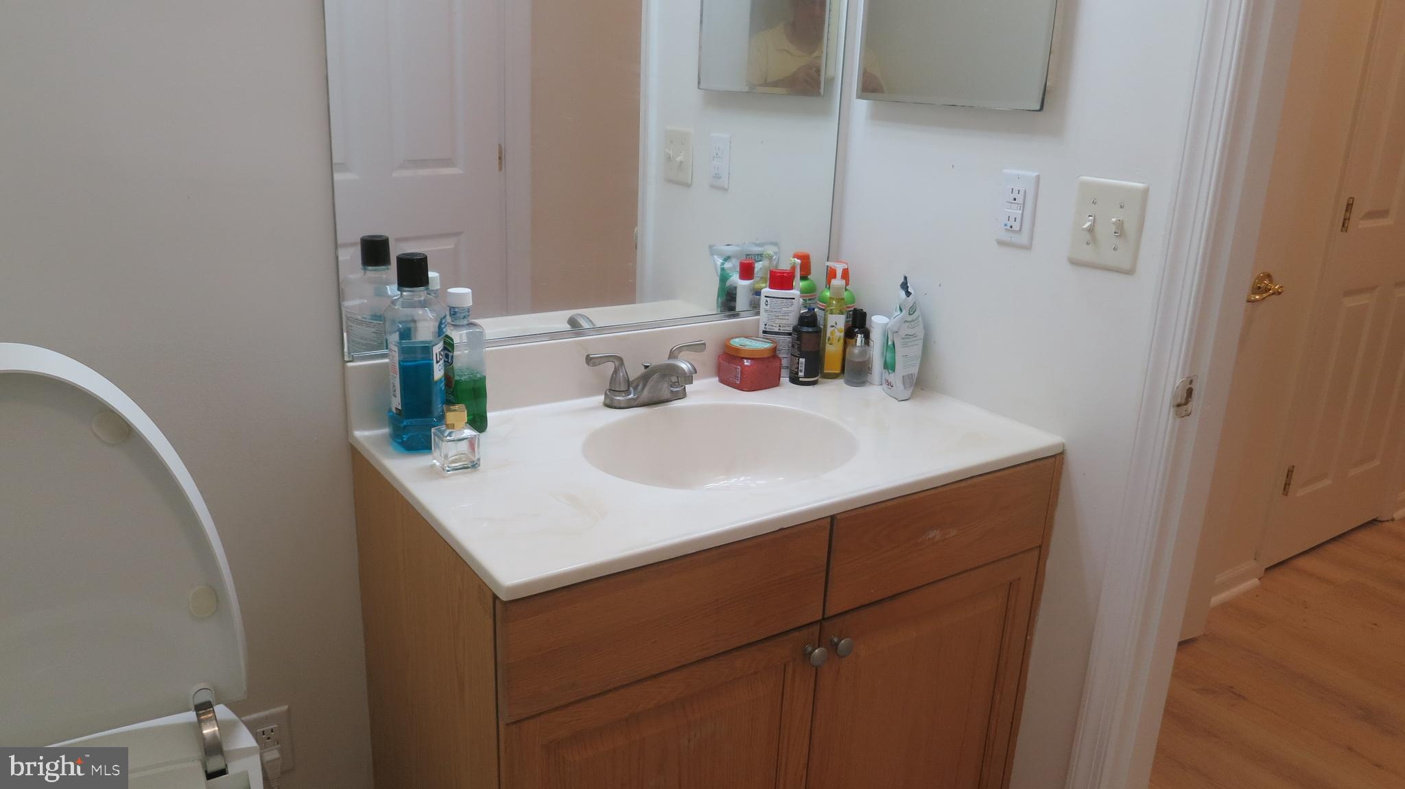121 Kyle Way Ewing, NJ 08628 - Photo 15 of 25 a bathroom with a sink vanity and a mirror