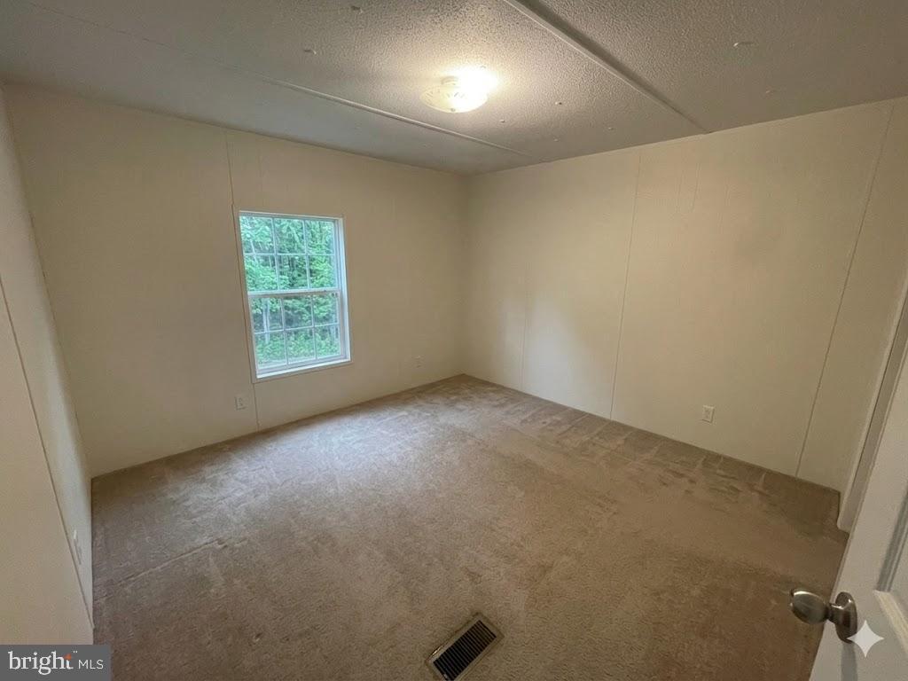 172 Rogers Mill Road Strasburg, VA 22657 - Photo 14 of 23 an empty room with a window