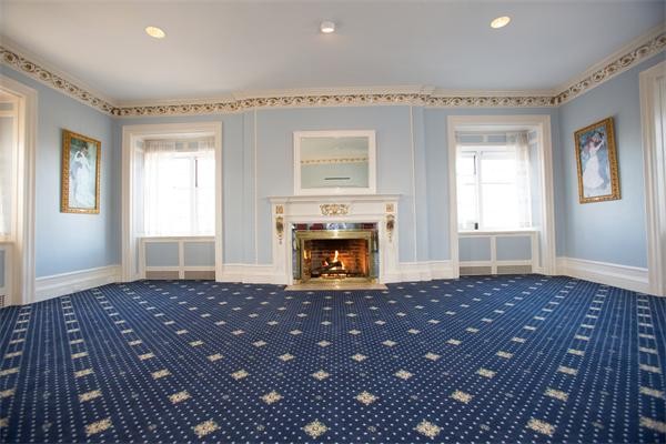 99 Westcliff Road Weston, MA 02493 - Photo 12 of 29 a view of empty room with wooden floor fireplace and windows