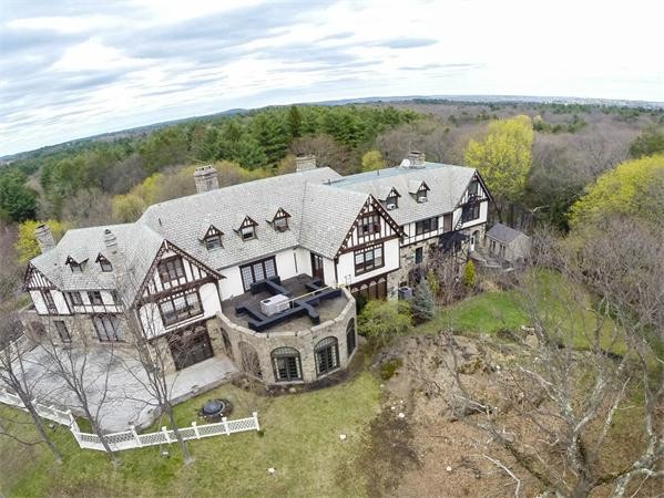 99 Westcliff Road Weston, MA 02493 - Photo 26 of 29 an aerial view of a house with garden space and outdoor seating