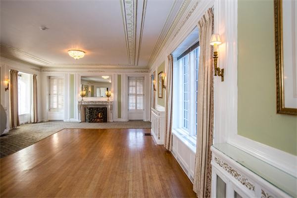 99 Westcliff Road Weston, MA 02493 - Photo 7 of 29 a view of livingroom with wooden floor and fireplace