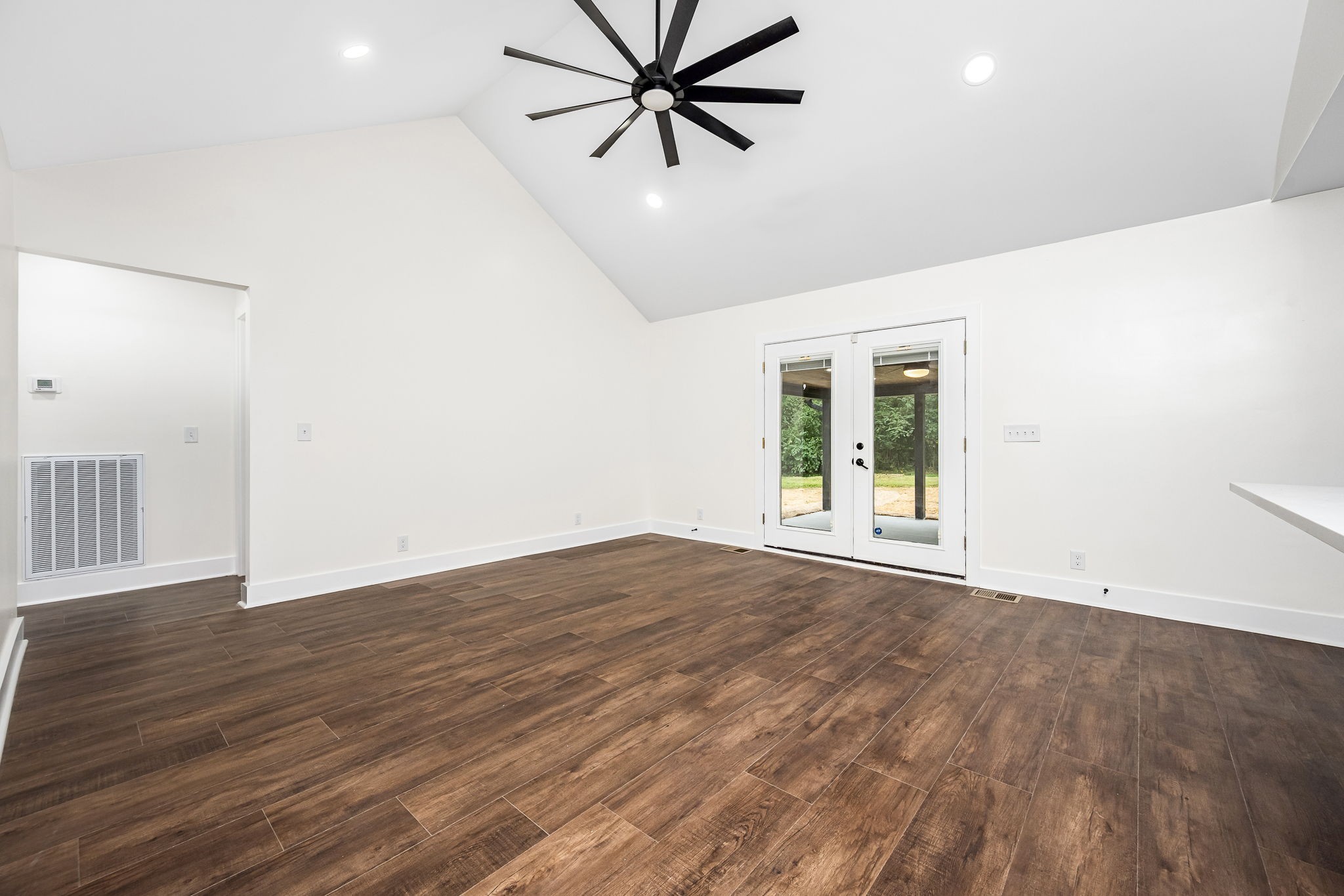 2712 Oak Point Street Murfreesboro, TN 37130 - Photo 11 of 45 wooden floor in an empty room with a window