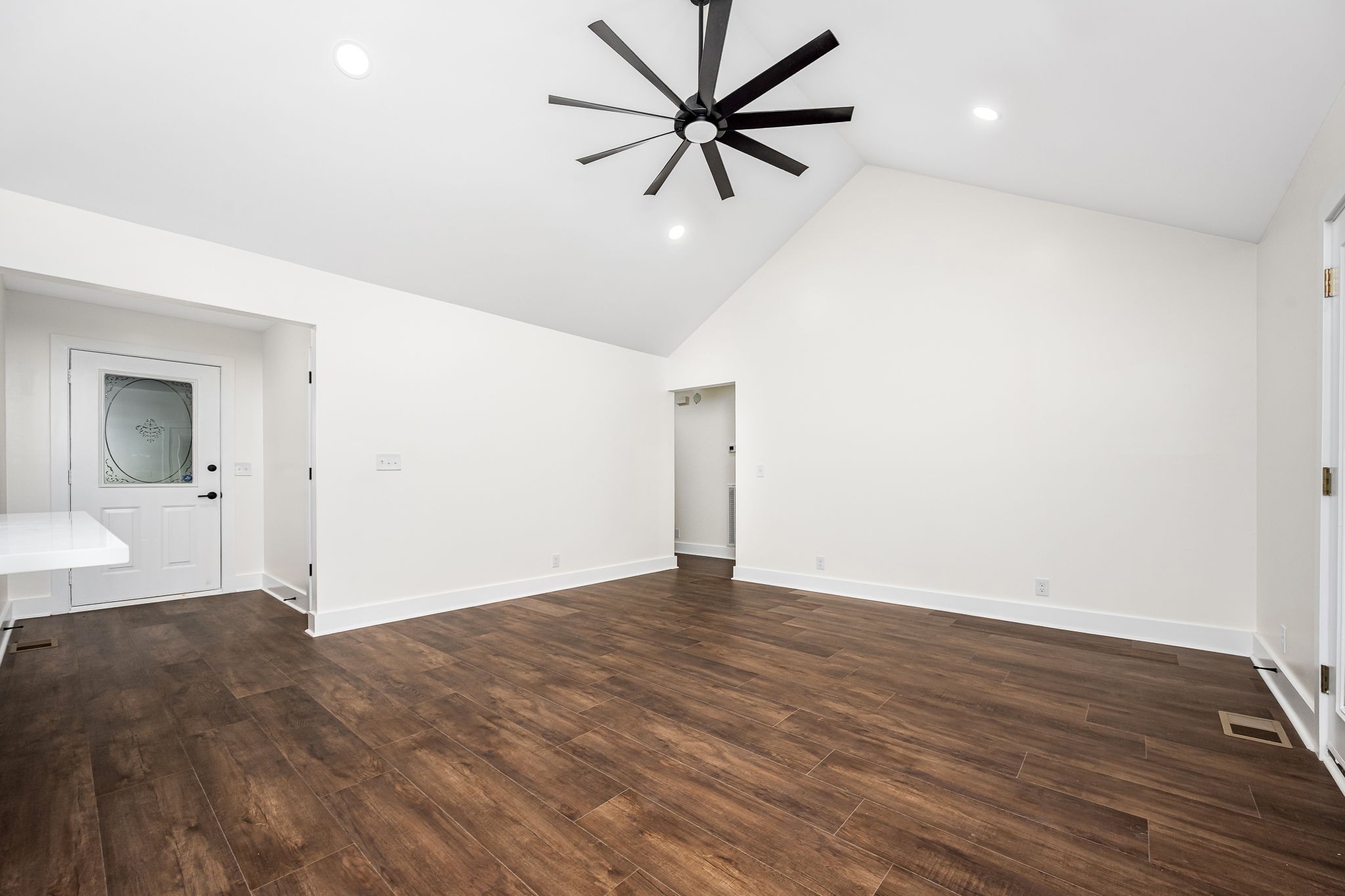 2712 Oak Point Street Murfreesboro, TN 37130 - Photo 12 of 45 an empty room with wooden floor and a ceiling fan