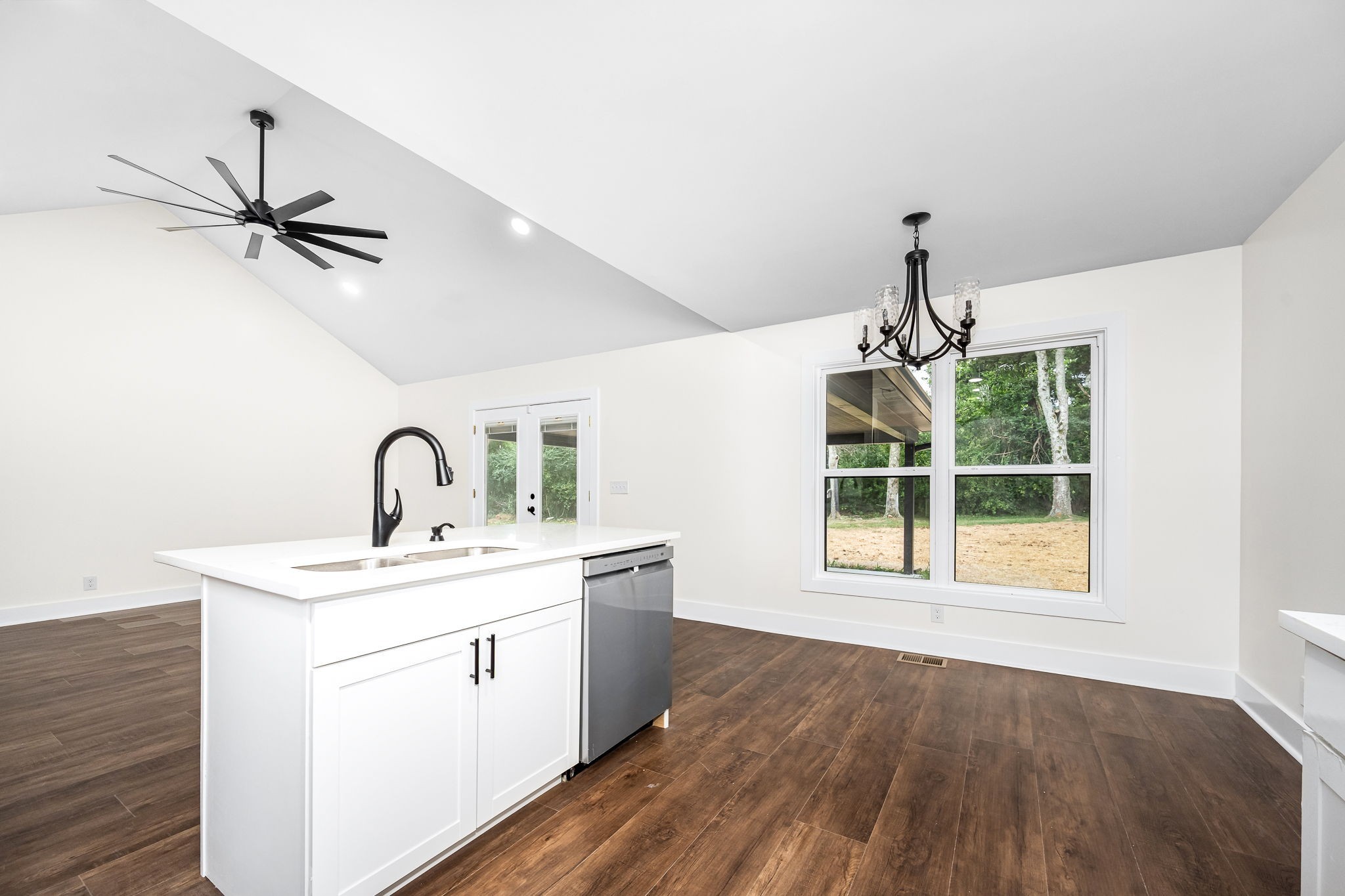 2712 Oak Point Street Murfreesboro, TN 37130 - Photo 19 of 45 a view of a kitchen with a sink dishwasher and wooden floor