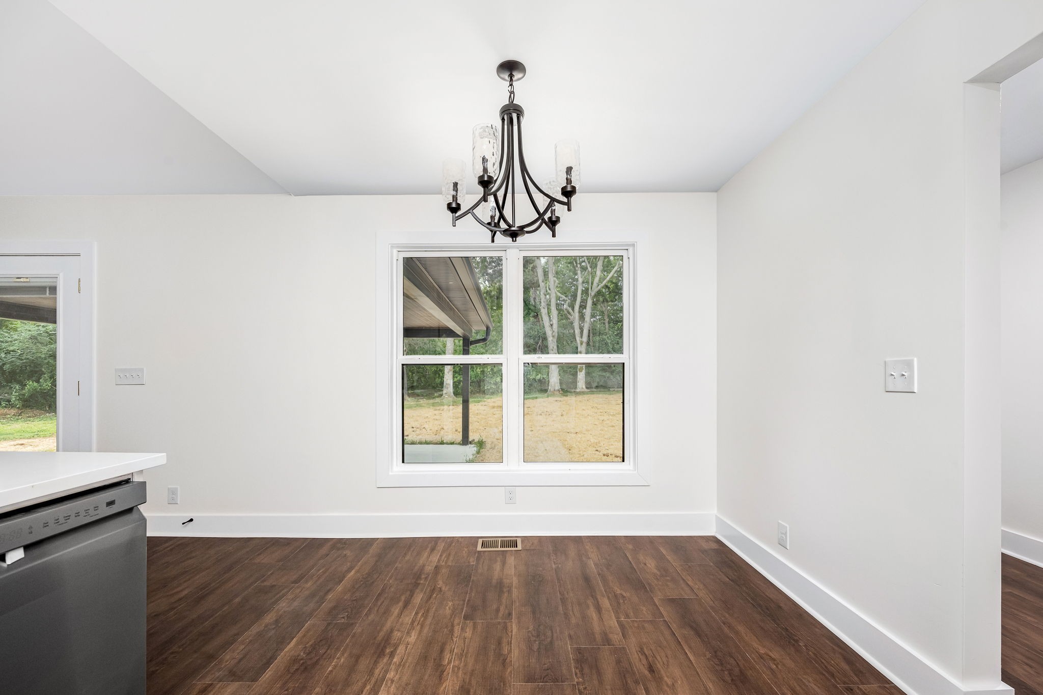 2712 Oak Point Street Murfreesboro, TN 37130 - Photo 20 of 45 a view of a livingroom with wooden floor and a window