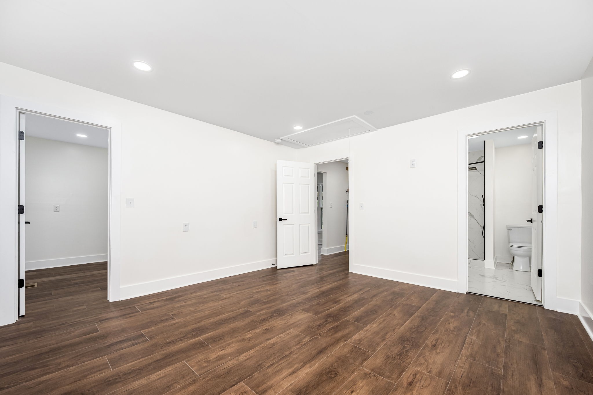 2712 Oak Point Street Murfreesboro, TN 37130 - Photo 22 of 45 an empty room with wooden floor & windows