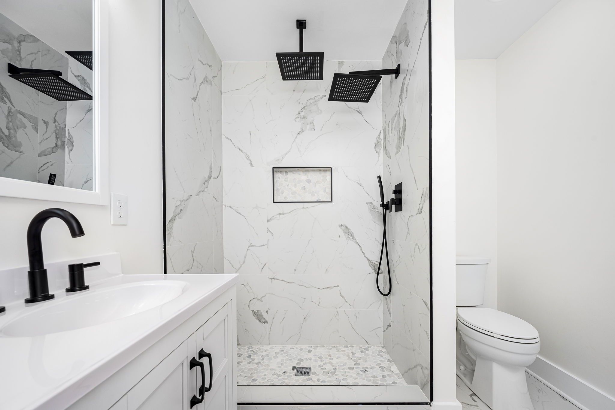 2712 Oak Point Street Murfreesboro, TN 37130 - Photo 24 of 45 a bathroom with a shower sink and toilet