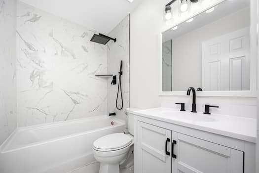2712 Oak Point Street Murfreesboro, TN 37130 - Photo 28 of 45 a bathroom with a sink a toilet and a bathtub