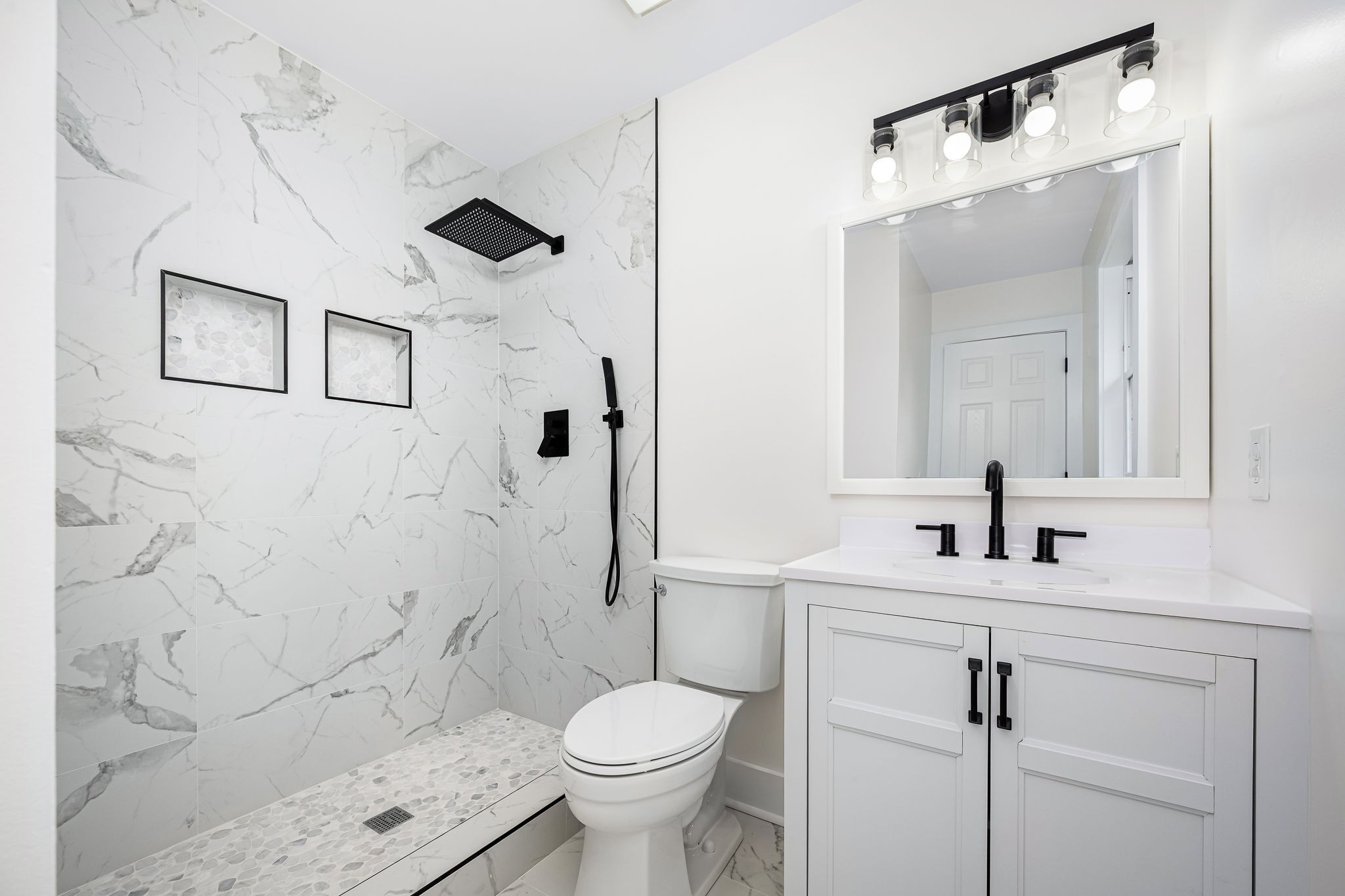 2712 Oak Point Street Murfreesboro, TN 37130 - Photo 31 of 45 a bathroom with a sink toilet and shower