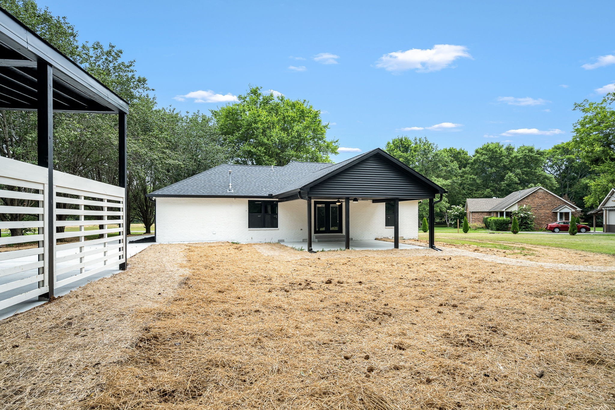 2712 Oak Point Street Murfreesboro, TN 37130 - Photo 40 of 45 a front view of a house with a yard and garage