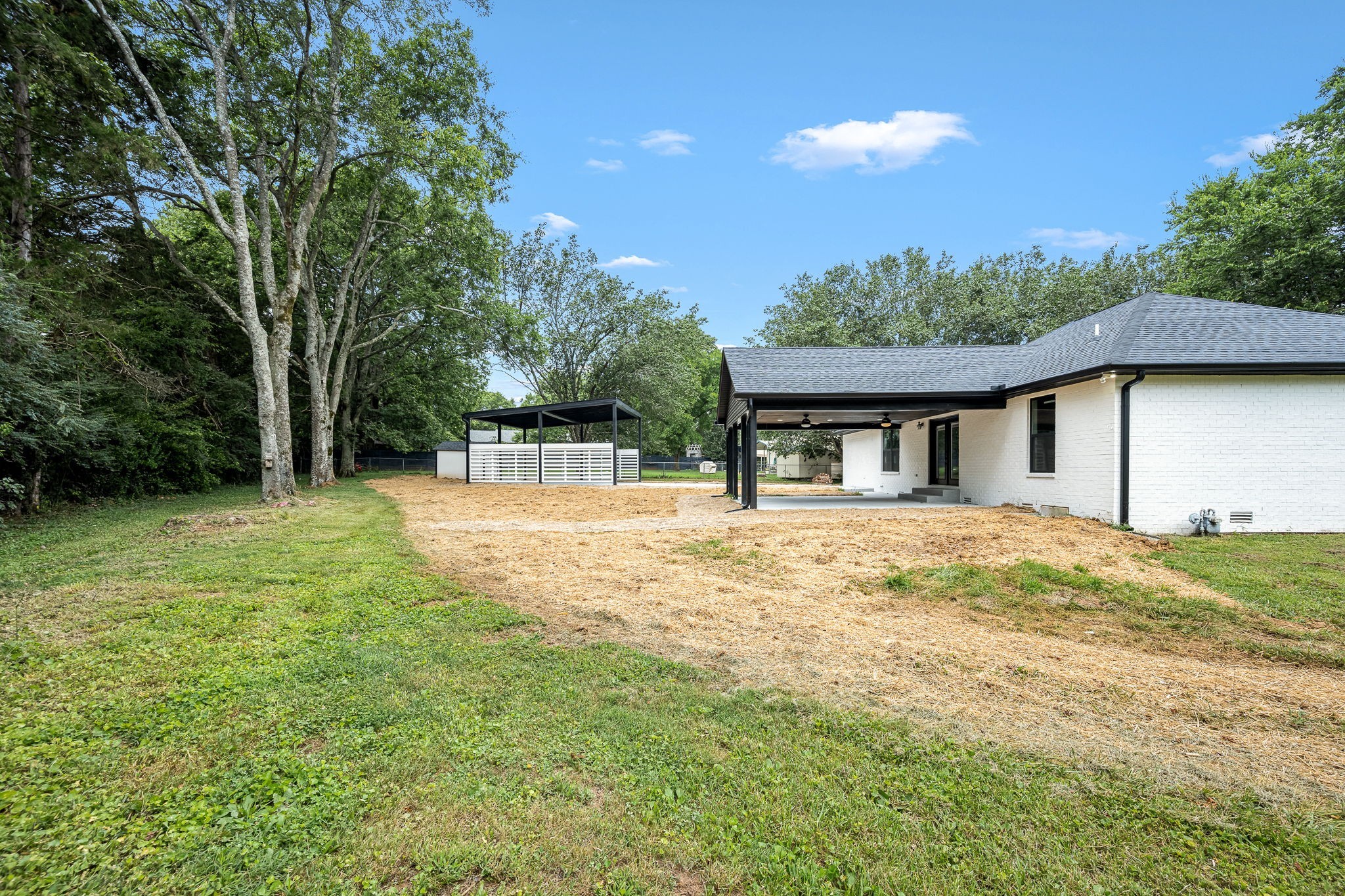 2712 Oak Point Street Murfreesboro, TN 37130 - Photo 42 of 45 a view of a house with backyard and trees