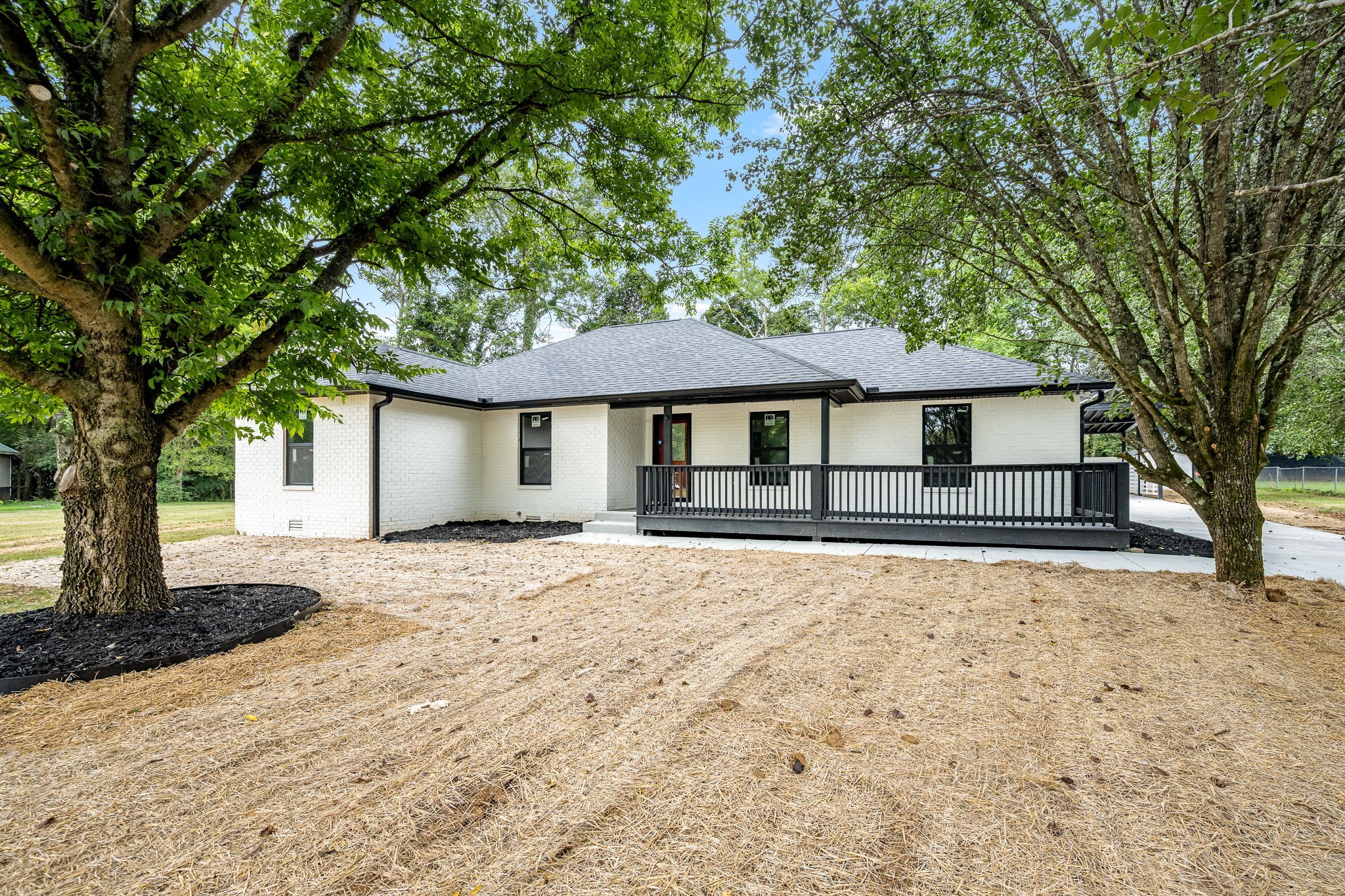 2712 Oak Point Street Murfreesboro, TN 37130 - Photo 5 of 45 a house with trees in the background