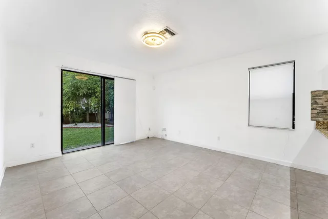 a view of an empty room with window