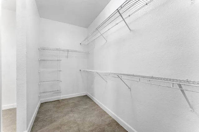 a view of a room with racks on the wall