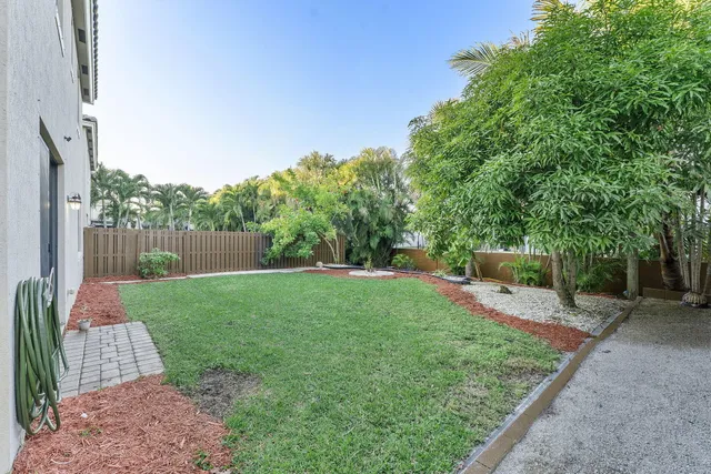 a view of backyard with green space
