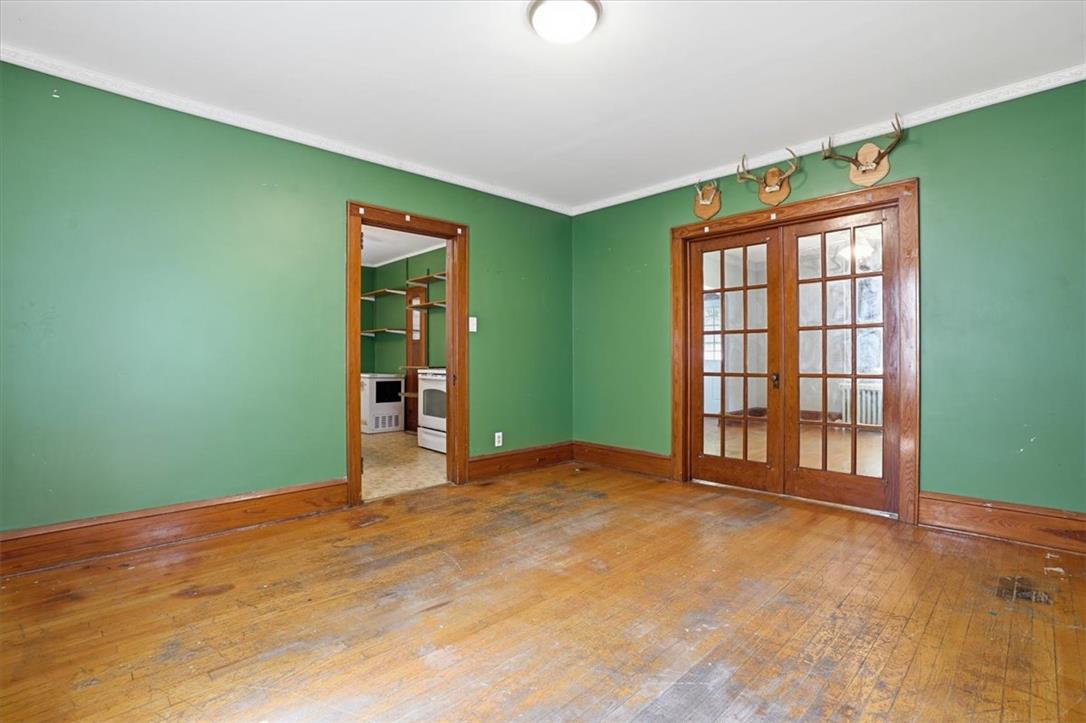 167 Main Road Lehighton, PA 18235 - Photo 20 of 41 Timeless wood flooring extends through this versatile room, featuring a pair of classic French doors.