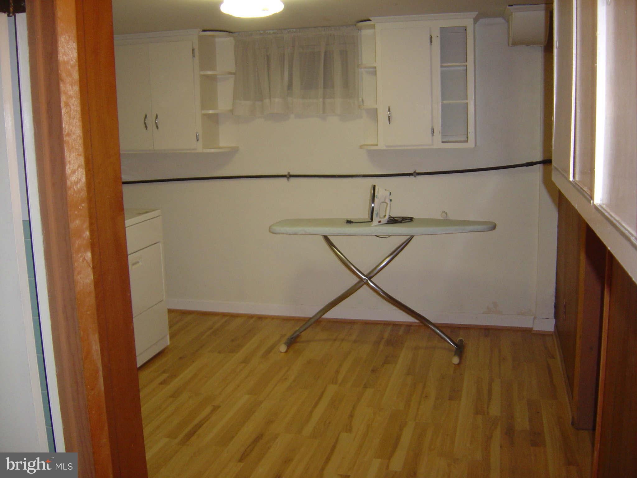 6014 Brunswick Street Springfield, VA 22150 - Photo 20 of 22 LAUNDRY RM W/ NEW PERGO LAMINATE