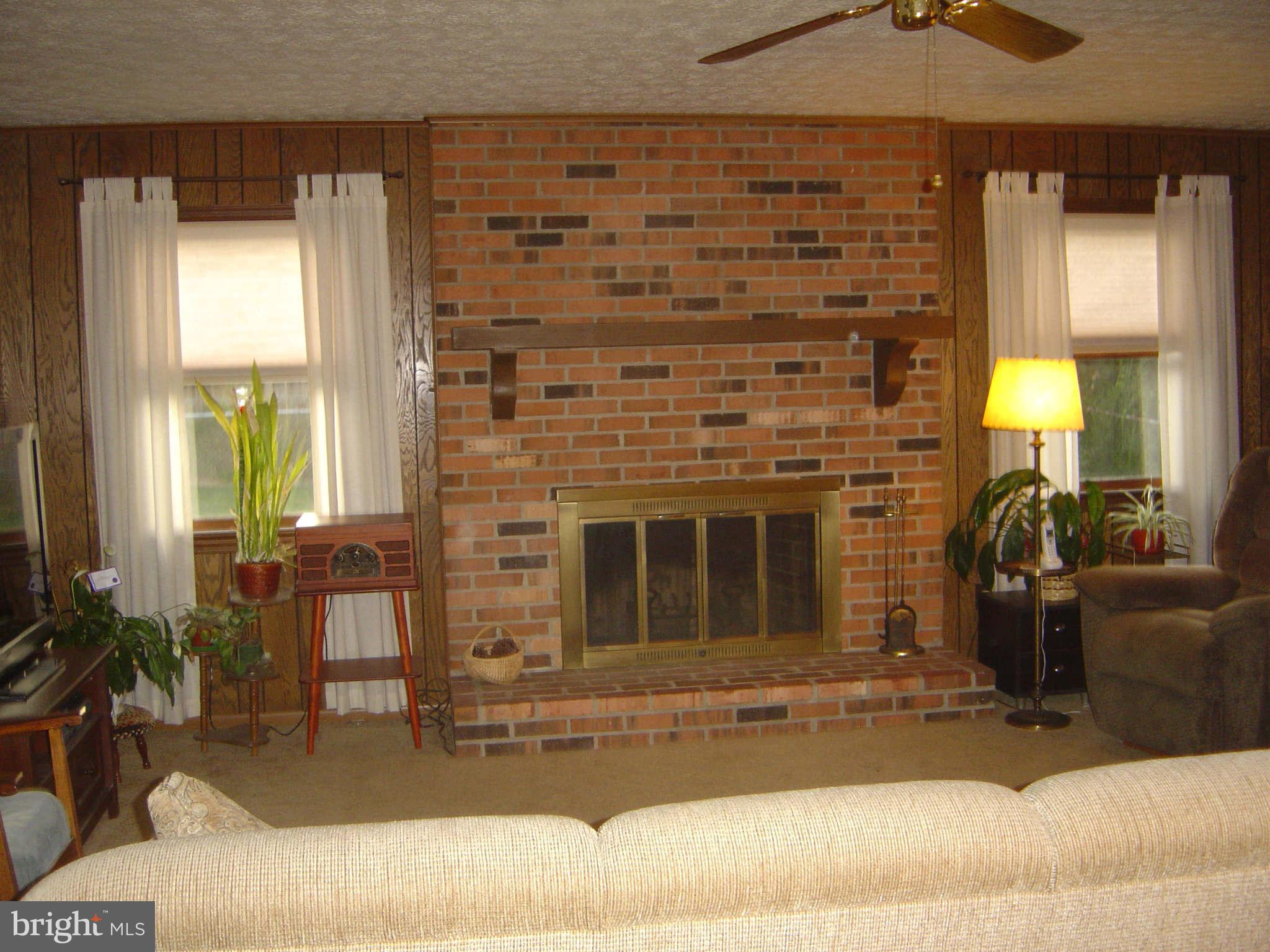 6014 Brunswick Street Springfield, VA 22150 - Photo 4 of 22 FAM RM BRICK FLOOR TO CEILING FIRE PLACE