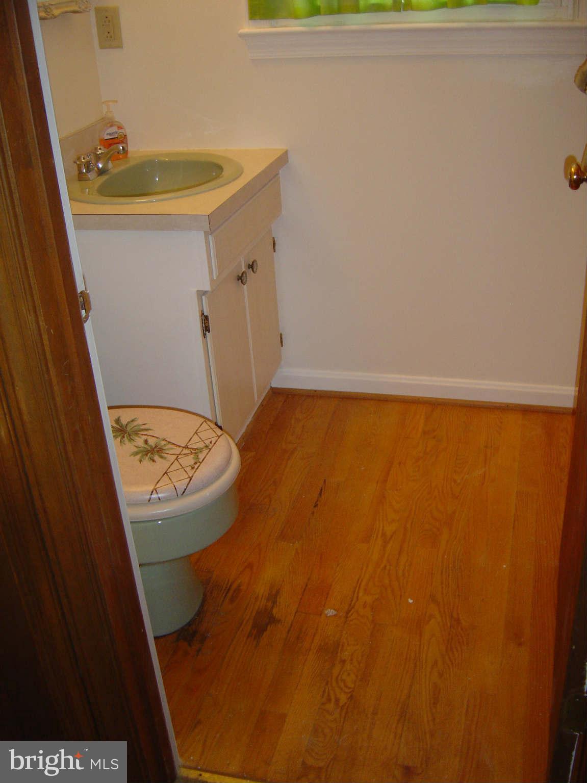 6014 Brunswick Street Springfield, VA 22150 - Photo 6 of 22 HALF BATH OFF FAMILY ROOM HD WOOD FL IN FAMILY RM
