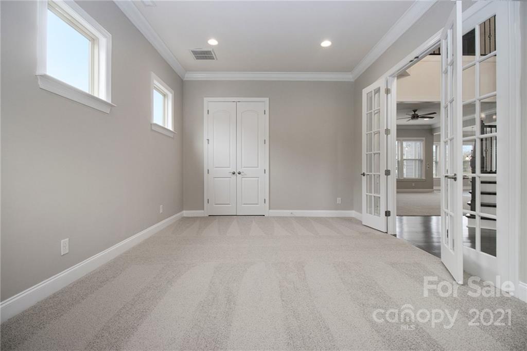 7007 Fallondale Road Waxhaw, NC 28173 - Photo 14 of 24 a view of empty room with windows