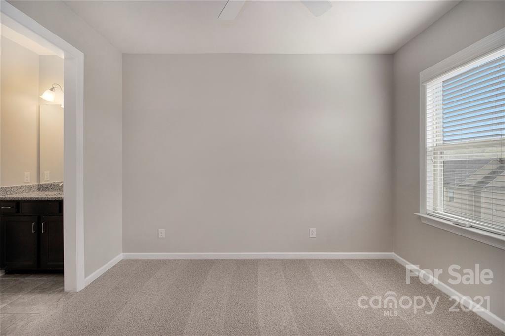 7007 Fallondale Road Waxhaw, NC 28173 - Photo 17 of 24 an empty room with windows