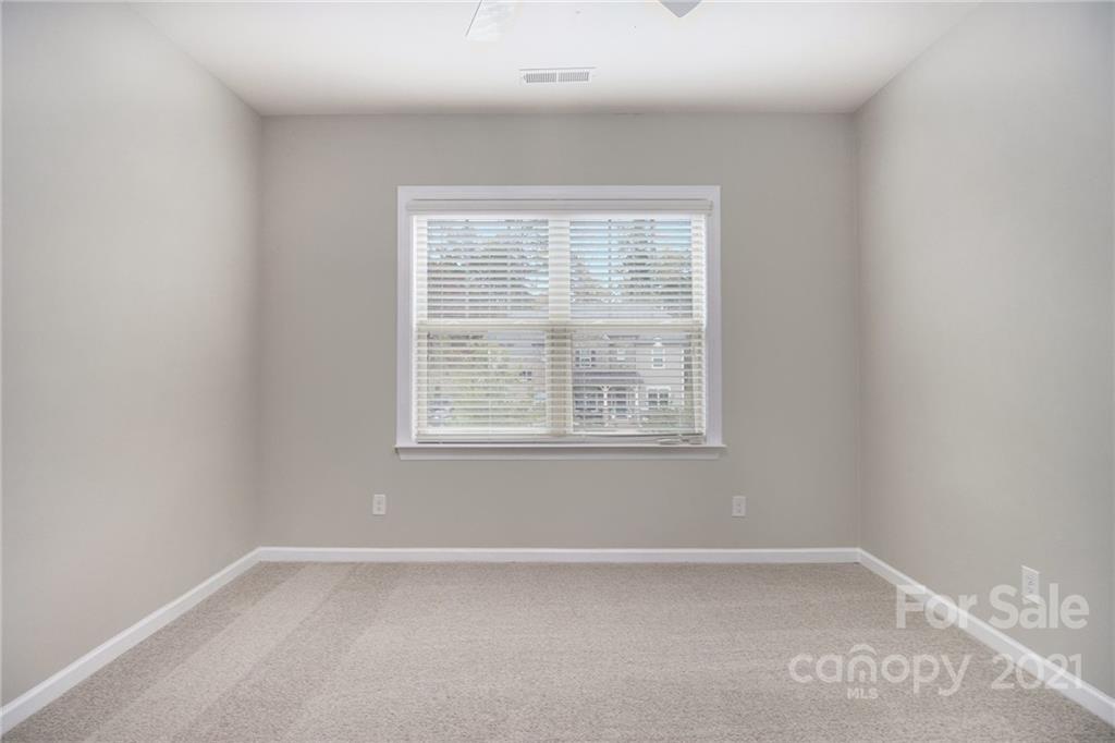 7007 Fallondale Road Waxhaw, NC 28173 - Photo 19 of 24 an empty room with a window