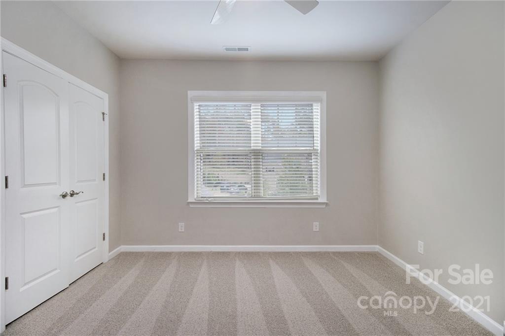 7007 Fallondale Road Waxhaw, NC 28173 - Photo 21 of 24 an empty room with a window