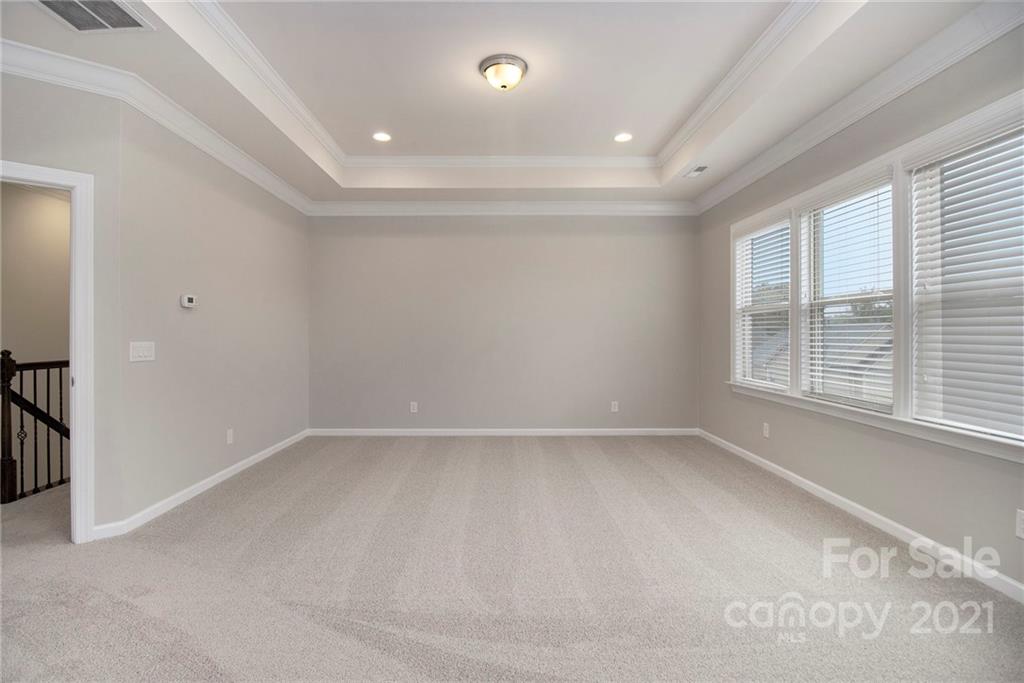 7007 Fallondale Road Waxhaw, NC 28173 - Photo 8 of 24 a view of an empty room with a window