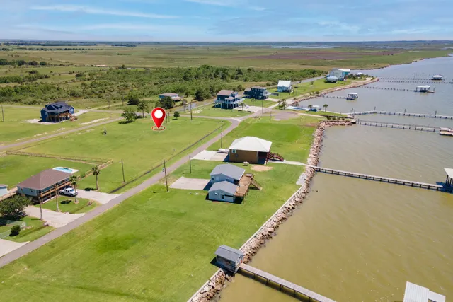 a view of an ocean and city