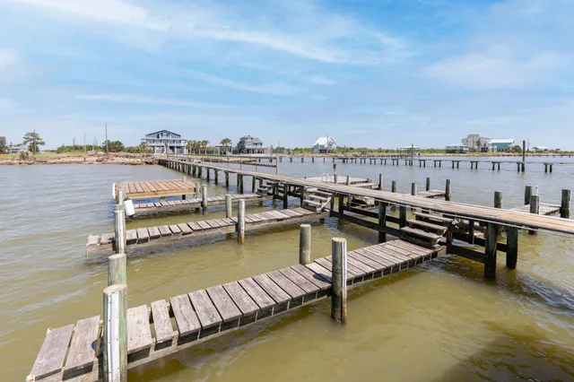 a view of balcony with wooden floor