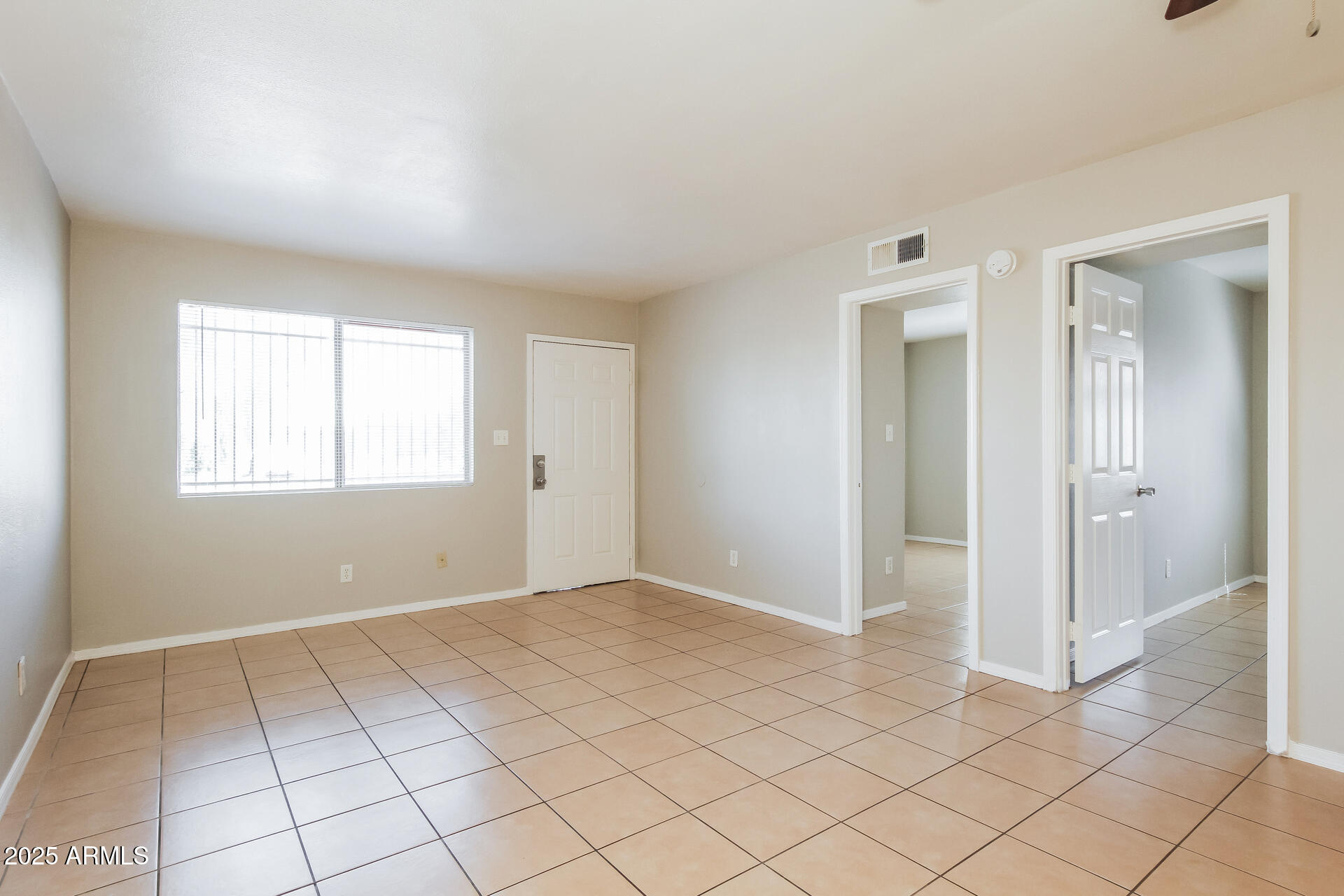 2747 East Chipman Road, Unit 1 Phoenix, AZ 85040 - Photo 4 of 16 5-photo-Living-Room-a25d85c8-f1db-4497-9