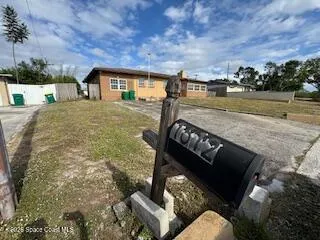 a terrace of a house with outdoor seating