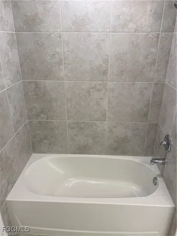 a bathroom with a bathtub