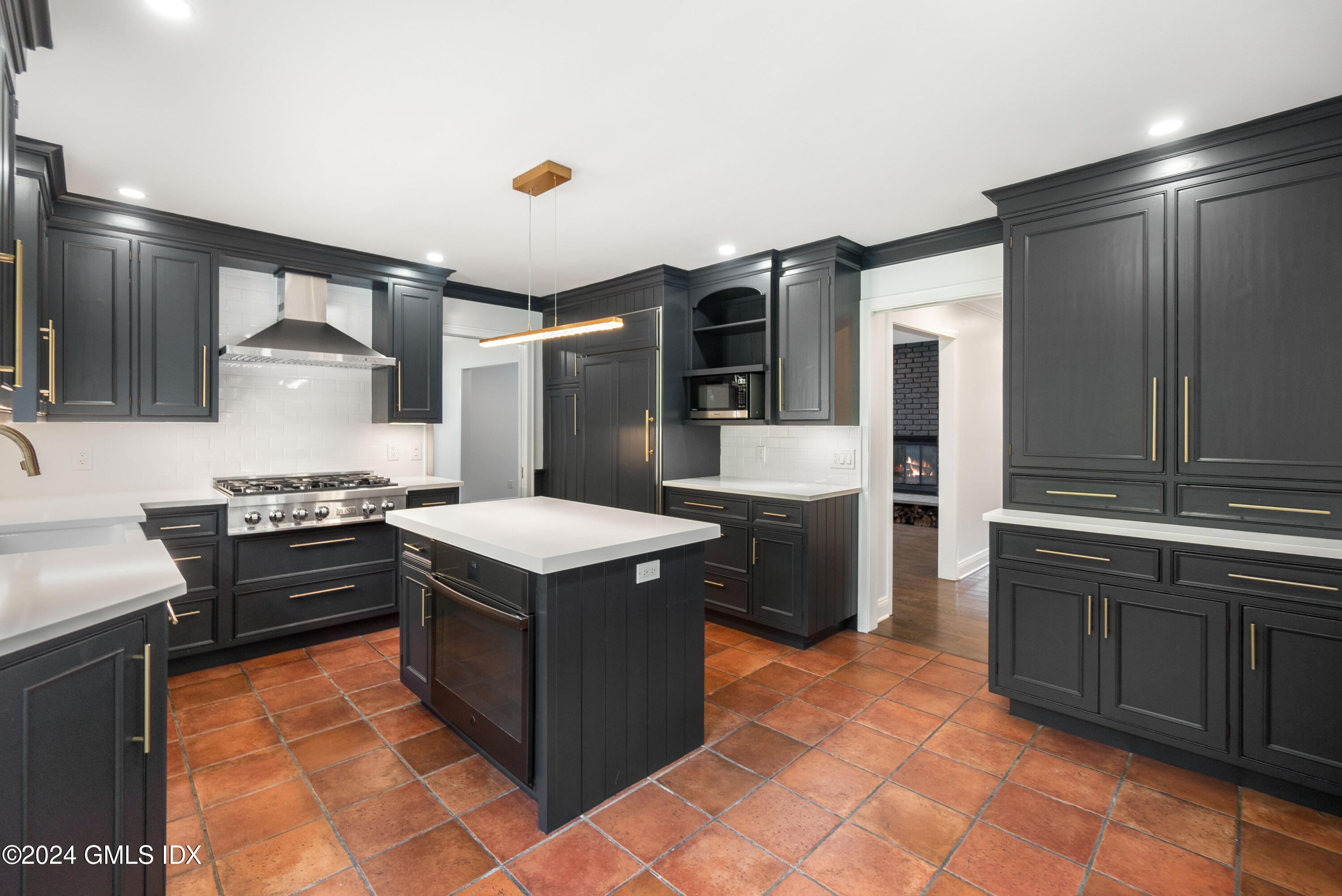 6 Hendrie Avenue Riverside, CT 06878 - Photo 8 of 44 a kitchen with stainless steel appliances granite countertop a stove a refrigerator and a sink