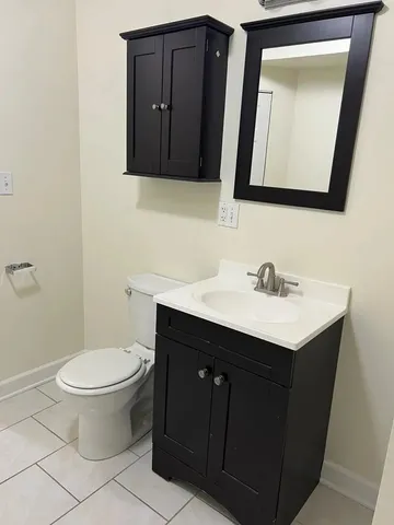 a bathroom with a bathtub and toilet
