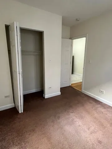an empty room with closet