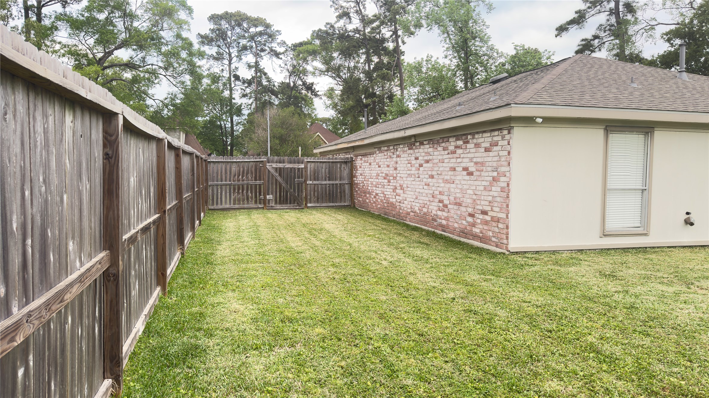 1918 Medway Drive Spring, TX 77386 - Photo 8 of 22 Plenty of side yard could be used for raised garden beds